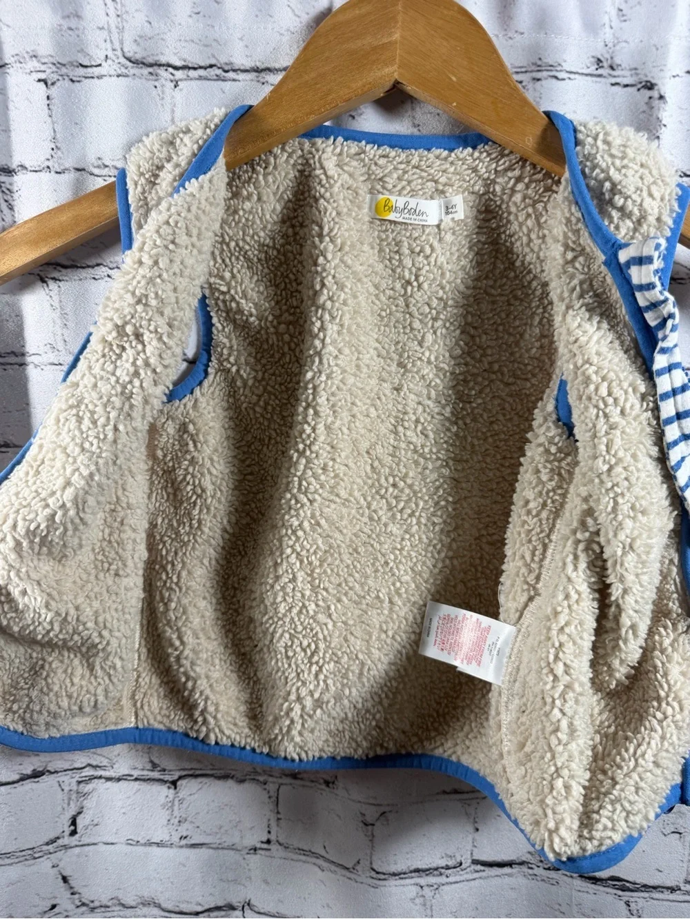 Baby Boden Cream Sherpa Vest with Blue Trim